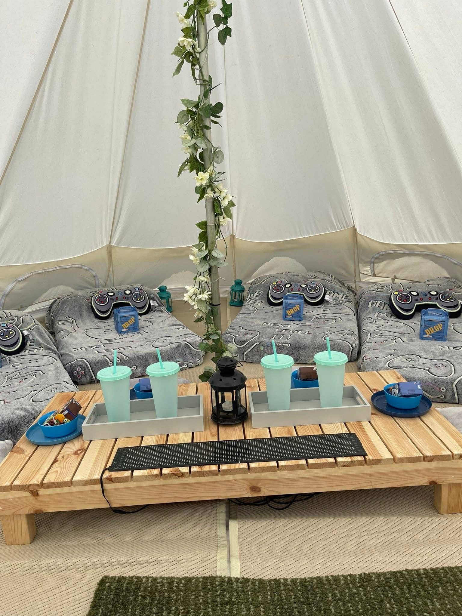 Gaming bundle sleepover inside bell tent