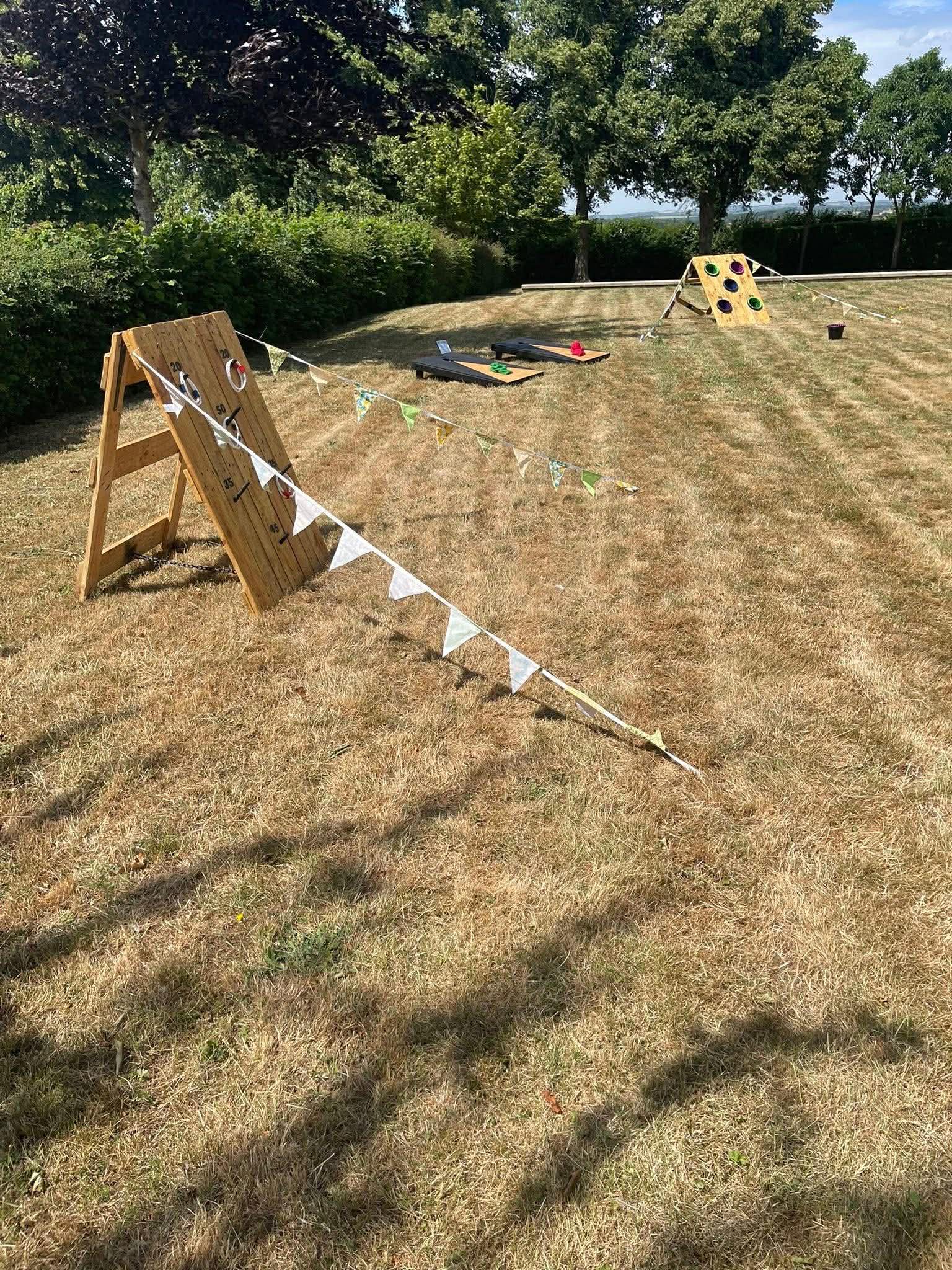 Garden games including ring toss and bunting